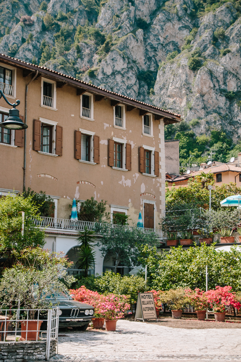 An Old Building with a vintage car parked out the front in Limone, Lake Garda