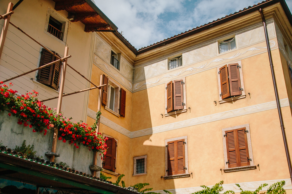 Peach and Yellow Coloured buildings on a street in Limone, Lake Garda